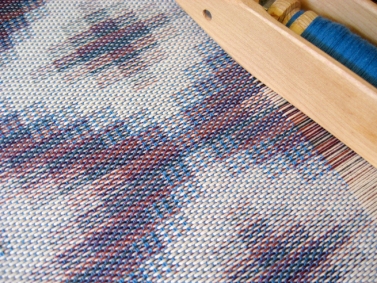 Turned Taquete Variation, fabric woven on 8 shafts, Tencel & cotton, 2015 (blue weft version on the loom)